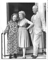 SA0706b - Edward Deming and Faith Andrews, together with an unidentified Shaker sister, standing on some steps outside a doorway.